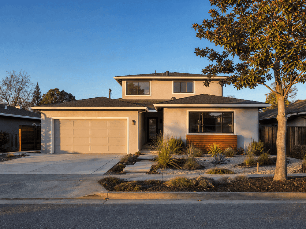 San Jose ranch home with new second-story addition, street view at golden hour